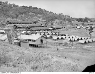 PORT MORESBY, NEW GUINEA. 1944-05-31. THE NEW GUINEA DETAILS DEPOT, LOCATED AT THE SITE OF THE OLD MURRAY BARRACKS AREA. A MAJORITY OF THE 1,000 MEN IN THE CAMP ARE FROM NEW GUINEA HOSPITALS AND ..