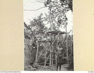 1942-10-09. AUSTRALIAN ENGINEERS ARE CONTINUALLY DEVISING NEW METHODS TO OVERCOME DIFFICULTIES OF SUPPLY TO TROOPS IN THE FORWARD AREAS IN NEW GUINEA. THIS PICTURE SHOWS THEM AT WORK ON THE ..