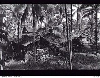 MILNE BAY, NEW GUINEA. 1943-06-26. CAMOUFLAGED ROYAL AUSTRALIAN AIR FORCE (RAAF) OPERATIONS ROOM AT HEADQUARTERS, 5TH AUSTRALIAN DIVISION