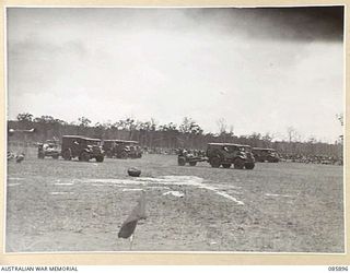 VEHICLES AND GUNS BEING RACED FORWARD TO DRILL POSITIONS IN THE ROYAL AUSTRALIAN ARTILLERY 25 POUNDER EVENT ORGANISED BY HQ ROYAL AUSTRALIAN ARTILLERY 9 DIVISION DURING THE 9 DIVISION GYMKHANA AND ..
