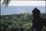 Portrait of man over-looking island