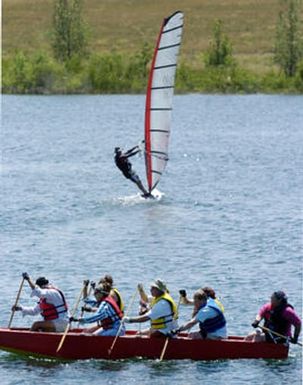 Aurora, CO July 19, 2005 Team Imua Polynesia practices for next week's dragon boat races at Aurora Resevoir. Rick Giase/Special to the News