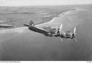 Bismarck Sea. 1943. An Allied Beaufighter aircraft heading out on patrol above the coast