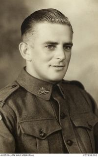 Studio portrait of VX48415 Lance Corporal (L Cpl) Robert Edward (Bob) Ross, 2/22 Battalion, of Shepparton, Victoria. The son of Sarah Isabell Ross and David James Ross, a Boer War veteran, Robert ..