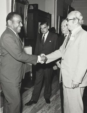 Peniame Naqasima, welcomed by Senator Justin O'Byrne at a reception held at the Parliament House, Canberra, 22 October 1974 / Norman Plant