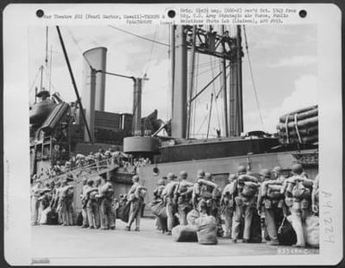 Air Force Personnel Board The Troop Transport Uss Dashing Wave, Docked At Pearl Harbor, Hawaii. They Are Bound For Saipan. June 1944. (U.S. Air Force Number 63548AC)