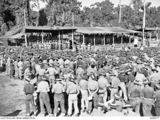 TOROKINA, BOUGAINVILLE. 1945-08-16. A GENERAL VIEW OF THE CROWD - MEMBERS OF THE AUSTRALIAN MILITARY FORCES, AND OTHERS IN THE SOLOMON ISLANDS, ATTENDING THE VICTORY THANKSGIVING SERVICE HELD AT ..