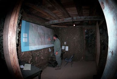 The interior of the underground Tactical Operations Center being used by the S-3 Section of the 2nd Brigade, 25th Infantry Division, during Operation Thunderbolt