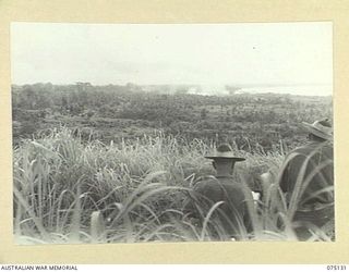 BULATAGI, NEW GUINEA. 1944-07-31. 25 POUNDER SHELLS BURSTING ON THE TARGET AREA DURING A PRACTICE SHOOT BY D TROOP, 28TH FIELD BATTERY