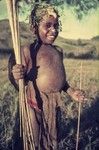 Kewa child, future warrior perhaps, young boy carries sticks