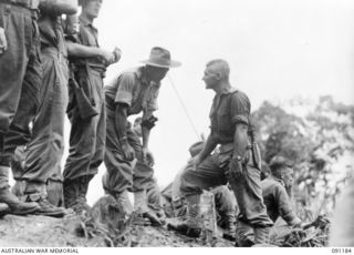 NUMA NUMA TRAIL, BOUGAINVILLE, 1945-04-24. BRIGADIER ARNOLD W. POTTS, COMMANDER 23RD INFANTRY BRIGADE, WHO IS ON A VISIT TO THE 23RD INFANTRY BATTALION, AND LIEUTENANT-COLONEL A. POPE, DURING THE ..