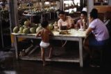 French Polynesia, merchant selling goods at Papeete market