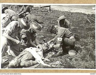 NEW GUINEA. 1943-11-20. STRETCHER BEARER CHAMPIONSHIP AT THE CHAMPIONSHIP SPORTS MEETING OF THE 18TH AUSTRALIAN INFANTRY BRIGADE, HELD TO CELEBRATE THE FOURTH ANNIVERSARY OF THE FORMATION OF THE ..