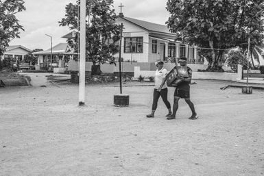 Black and white image of two locals, Fakaofo, Tokelau