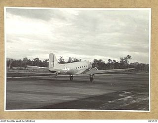 MAREEBA, QLD. 1944-04-10. THE DOUGLAS C47 AIRCRAFT, MILITARY VERSION OF THE DC3 AIRLINER, "IRENE" (CALL SIGN VH-CFB) OF THE UNITED STATES ARMY AIR FORCE, WITH AN ALL-AMERICAN CREW, TAKING OFF FOR ..