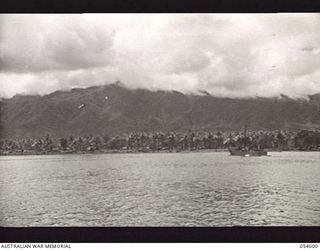 GILI GILI, NEW GUINEA, 1943-07-15. EMBARKATION BEACH FOR THE 29TH AUSTRALIAN INFANTRY BRIGADE, 5TH AUSTRALIAN DIVISION WITH LCI (LANDING CRAFT, INFANTRY) HEADING IN TO BEACH