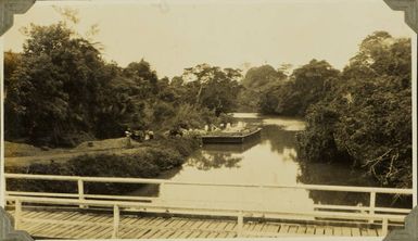 Stone being unloaded? from a barge in Fiji for road construction, 1928