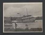 MV Elevala anchored, with people in the water surrounding the vessel, Papua New Guinea, c1945 to 1952