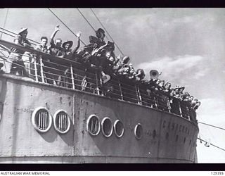 SYDNEY, NSW. 1946-05-16. FORTY SEVEN STOWAWAYS CONFINED TO THE FOCSLE OF THE TROOPSHIP CANBERRA, AT CIRCULAR QUAY AFTER IT HAD ARRIVED FROM RABAUL. THE STOWAWAYS GAVE THEMSELVES UP AFTER TWO DAYS ..