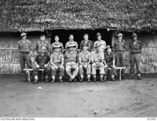 BUNA, NEW GUINEA. 1944-04-18. ADMINISTRATION STAFF OF NO.7 AND NO.8 SECTIONS, NEW GUINEA DETAILS DEPOT, HEADQUARTERS BUNA BASE SUB-AREA, WITH ATTACHED PERSONNEL. IDENTIFIED PERSONNEL ARE:- SX2836 ..