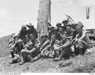 KOKODA TRAIL, NEW GUINEA. 1943-12-19. TROOPS OF THE 2/9TH AUSTRALIAN INFANTRY BATTALION, 18TH AUSTRALIAN INFANTRY BRIGADE, WHO WERE EXTRAS DURING THE FILMING OF SEQUENCES FOR THE PRODUCTION, "RATS ..