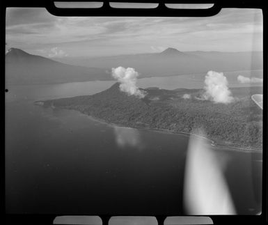 Mt Lolobau, 3058 feet high, Mt Ulawun (Father), 7476 feet high, and Mt Bamus (South Son), 7446 feet high, New Britain, Papua New Guinea