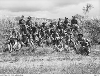 WEWAK, NEW GUINEA. 1945-05-10. D COMPANY, 2/4 INFANTRY BATTALION, THE FIRST TROOPS INTO WEWAK, HAVE A BREW AT KING'S CROSS