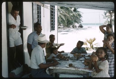 John James Marsters hosting the Second Family umukai during Empire Day celebrations, Palmerston Island