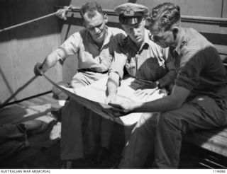 AT SEA, EN ROUTE TO SINGAPORE. 1945-09-03. MEMBERS OF 2 AUSTRALIAN POW RECEPTION GROUP TRAVELLED TO SINGAPORE ABOARD THE MV DUNTROON TO ESTABLISH RECEPTION CAMPS FOR AUSTRALIAN PRISONERS OF WAR ..