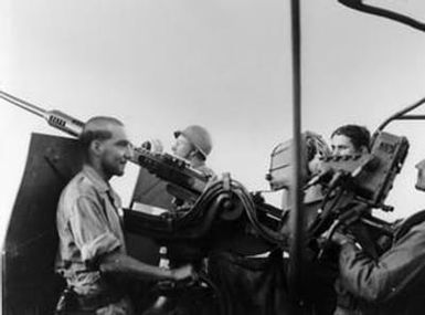 [U.S. Marines at an Anti-Aircraft Gun]