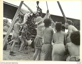 1943-01-11. SALVAGING AIRCRAFT IN NEW GUINEA. LITTLE IS HEARD OF THE GROUND STAFF OF THE RAAF - THE MEN WHO WORK ALL HOURS AND UNDER ALL CONDITIONS, KEEPING OUR AIRCRAFT IN THE AIR, AND STILL LESS ..