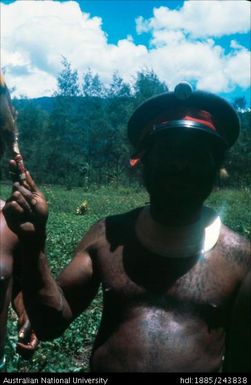 Unidentified man wearing a hat