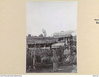 SANGARA, NEW GUINEA, 1945-07-05. NATIVE HUTS ON SANGARA RUBBER PLANTATION. THE PLANTATION, KNOWN AS "MASONS" WAS OCCUPIED BY THE JAPANESE ON THEIR WAY FROM POPONDETTA TO KOKODA