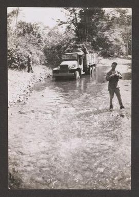 [Truck in Creek]