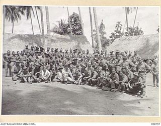 KERAVIA BAY, NEW BRITAIN. 1945-11-12. THE ENTIRE COMPANY, ROYAL NETHERLANDS EAST INDIES EX-PRISONERS OF WAR WHO ARE AWAITING MOVEMENT TO THEIR HOMELAND