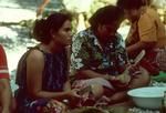 Grating ingredients for vaihu tamoko for fakanoanoa (evening mourning gathering)