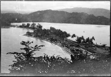 View towards mainland across isthmus with breakwaters visible on the shore, Salamaua, New Guinea, 1936 / Sarah Chinnery