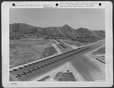 Aerial View Of Inspection Of Republic P-47 'Thunderbolts' Of The 318Th Fighter Group, Prior To Move To Saipan, Marianas Islands. 15 May 1944. Bellows Field, Oahu, Hawaii. (U.S. Air Force Number 63568AC)