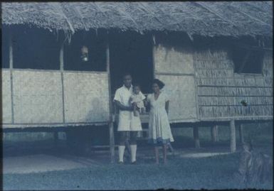 Kairi Fae (Malaria Control Assistant) and his wife Kairu and their first-born : Mapamoiwa Station, D'Entrecasteaux Islands, Papua New Guinea, 1956-1959 / Terence and Margaret Spencer