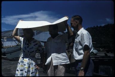 During the making of a film on malaria control, embarking at the wharf, with Ray Carlaw (Health Education Officer) (1) : Rabaul, New Britain, Papua New Guinea, 1960-1961 / Terence and Margaret Spencer