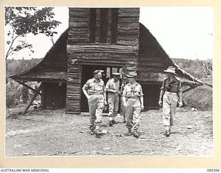 JACQUINOT BAY, NEW BRITAIN. 1945-04-08. SENATOR J.M. FRASER, ACTING MINISTER FOR THE ARMY (4), AND SENIOR OFFICERS LEAVING THE CHAPEL AT 105 CASUALTY CLEARING STATION. THE CHAPEL WAS BUILT BY ..