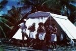 Scientists eating lunch at Bikini Island encampment "Little Petunia." L to R: Edward Barr, Bob Dill, Duane Carlston, George Brayton, Wayne Runyon