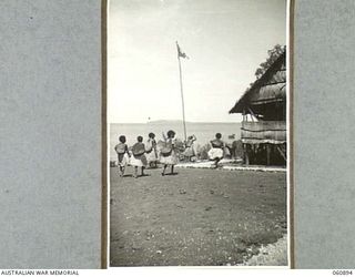 PA PA, PAPUA. 1943-12-02. POLICE POST, SHOWING PORTION OF THE PATROL OFFICERS RESIDENCE AND THE AUSTRALIAN FLAG FLYING ON THE FLAG POLE
