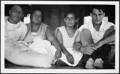 H Cain and T Heard with their hostesses at Falelatai, Western Samoa