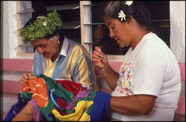 Two women sewing tivaevae