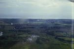 Aerial view of Bereina airstip and station and the Ungabunga [Angabanga] River (which like most delta rivers periodically changes its course)