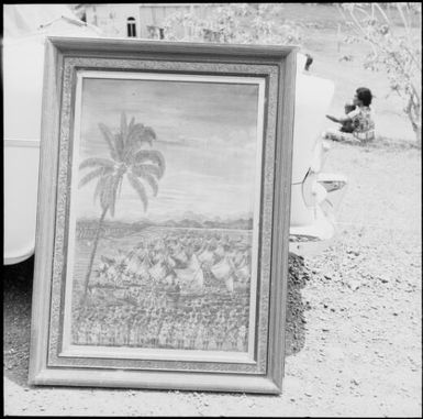 Painting leaned against the back of a car, Taveuni, Fiji, 1966 / Michael Terry