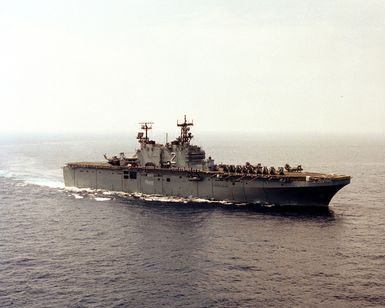 A starboard view of the amphibious assault ship USS SAIPAN (LHA 2) underway during the NATO Southern Region exercise DRAGON HAMMER '90