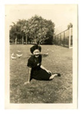 Woman sitting on grass