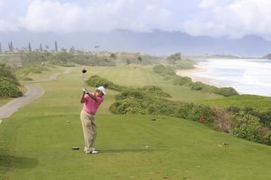 Barack Obama plays golf with Prime Minister Najib Razak, Joe Paulsen, and Mike Brush in Kaneohe Bay, Hawaii, December 24, 2014